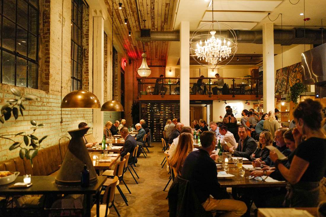 The Mezzanine Table is located on the top level of Paladar 511, overlooking the dining room below